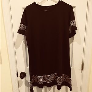 Short sleeve black dress with embroidered design
